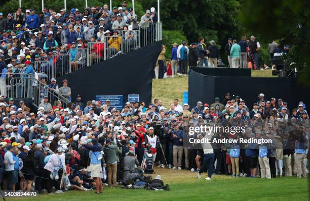 General view is seen as Hideki Matsuyama of Japan plays a second shot on the 18th hole during the final round of the 122nd U.S. Open Championship at...