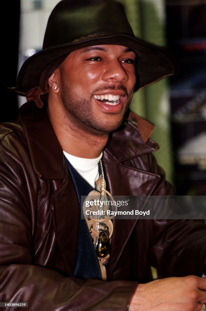 Common Rapper Sign Rapper Common signs autographs and greets fans at George's Music Room ...