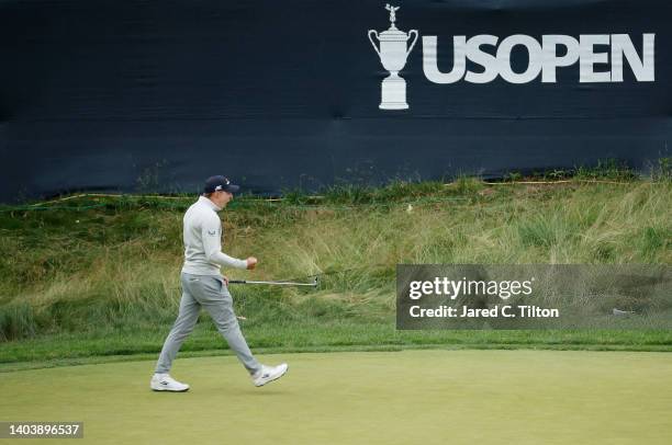 Matt Fitzpatrick of England celebrates making a long putt for birdie on the 13th green during the final round of the 122nd U.S. Open Championship at...