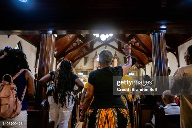 People participate in a service at the Reedy Chapel A.M.E. Church on June 19, 2022 in Galveston, Texas. Galveston island is the birthplace of...