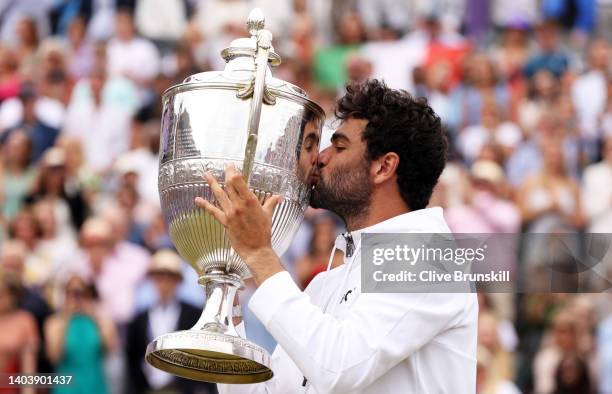 Matteo Berrettini of Italy kisses the trophy after winning against Filip Krajinovic of Serbia during the Men's Singles Final match on day seven of...