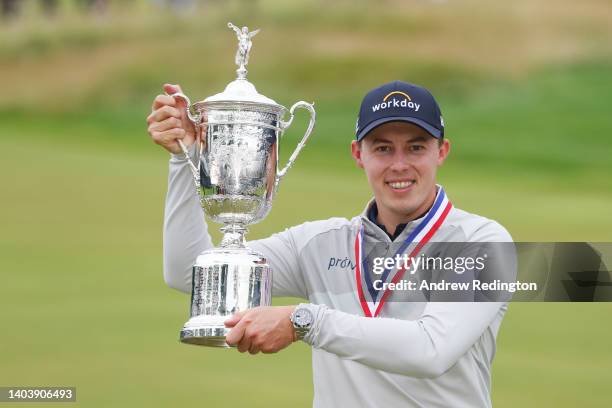 Matt Fitzpatrick of England celebrates with the U.S. Open Championship trophy after winning during the final round of the 122nd U.S. Open...