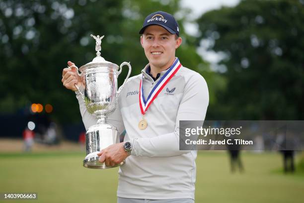 Matt Fitzpatrick of England celebrates with the U.S. Open Championship trophy after winning during the final round of the 122nd U.S. Open...