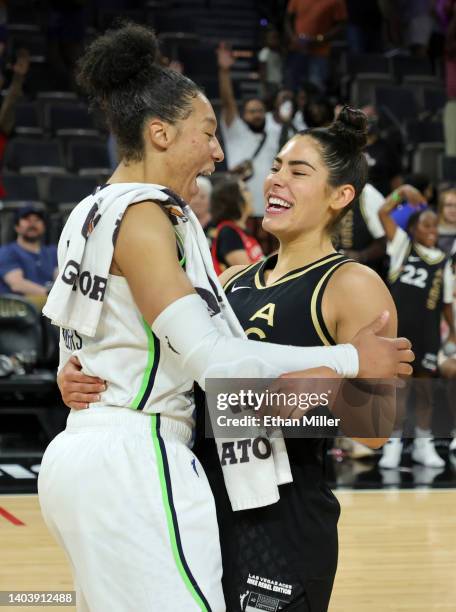 Aerial Powers of the Minnesota Lynx and Kelsey Plum of the Las Vegas Aces embrace on the court after their game at Michelob ULTRA Arena on June 19,...