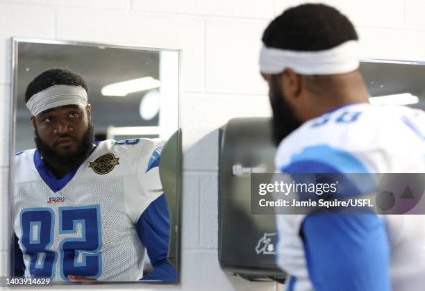 Shareef Miller of the New Orleans Breakers looks in the mirror before the game against the Houston Gamblers at Legion Field on June 19, 2022 in...