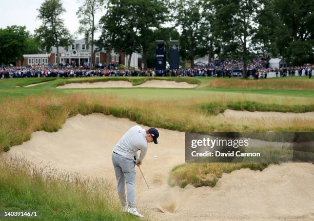 Matthew Fitzpatrick of England plays his second shot on the 18th hole during the final round of the 2022 U.S.Open at The Country Club on June 19,...