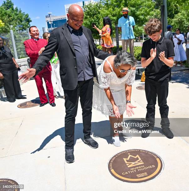 Alfred Liggins and Cathy Hughes attend 2022 Black Music & Entertainment Walk Of Fame Induction Ceremony at The Home Depot Backyard on June 18, 2022...