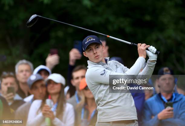 Matthew Fitzpatrick of England plays his tee shot on the 15th hole during the final round of the 2022 U.S.Open at The Country Club on June 19, 2022...