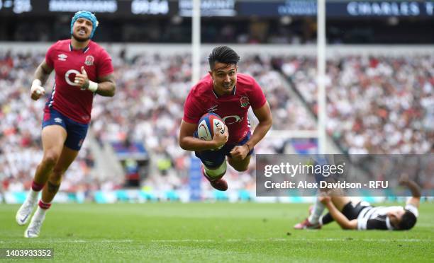 Marcus Smith of England scores his sides 3rd try during the International match between England and Barbarians at Twickenham Stadium on June 19, 2022...