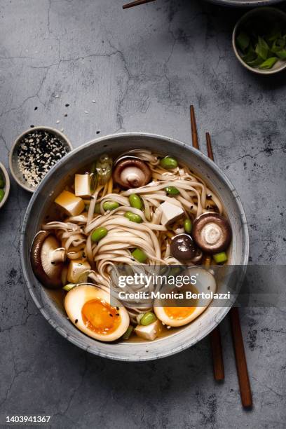 ramen bowl with boiled eggs and shiitake mushroom - asiatische küche stock-fotos und bilder