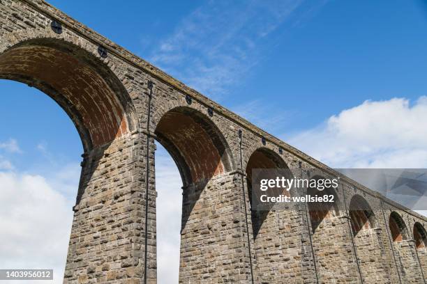 ribblehead viaduct under a blue sky - ribblehead viaduct stock pictures, royalty-free photos & images