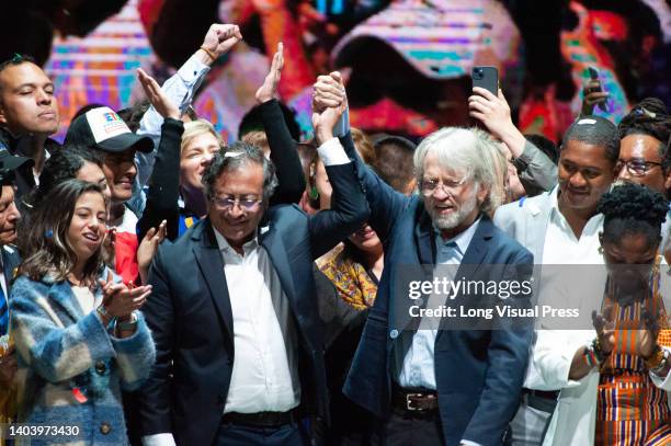 President elect of Colombia, Gustavo Petro reacts to politician Antanas Mockus at the movistar Arena in Bogota, Colombia after results showed...