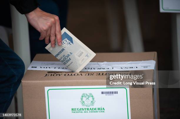 People vote during the second round of presidential elections in Bogota, Colombia on June 19, 2022.