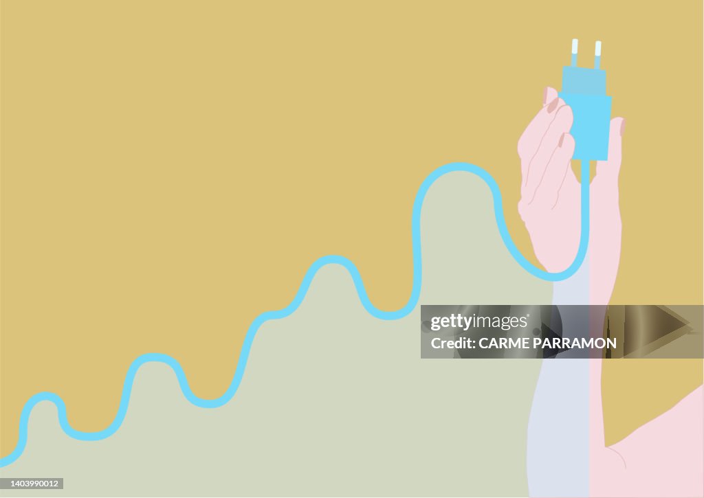 Hand Unplugging A Plug Because The Price Of Light Goes Up High-Res ...