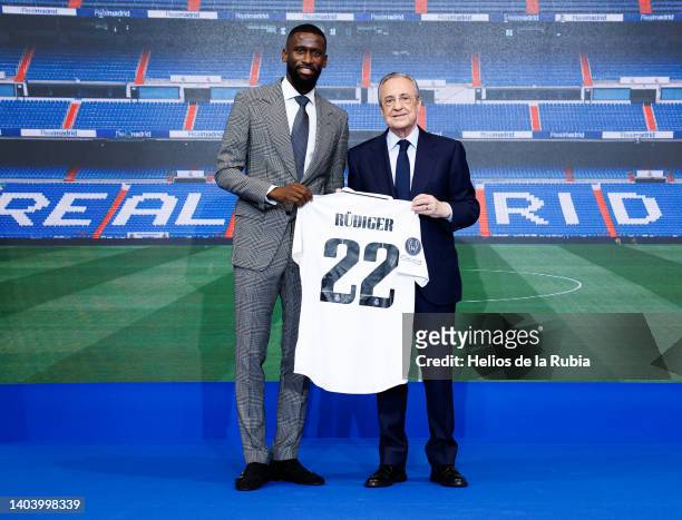 Antonio Rüdiger of Real Madrid poses with president Florentino Perez during his official presentation at Valdebebas training ground on June 20, 2022...