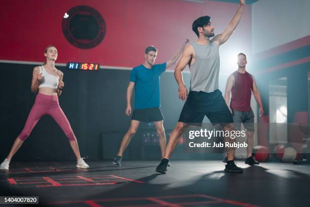 diverse group of people at a dance lesson in the gym - dance challenge stock pictures, royalty-free photos & images