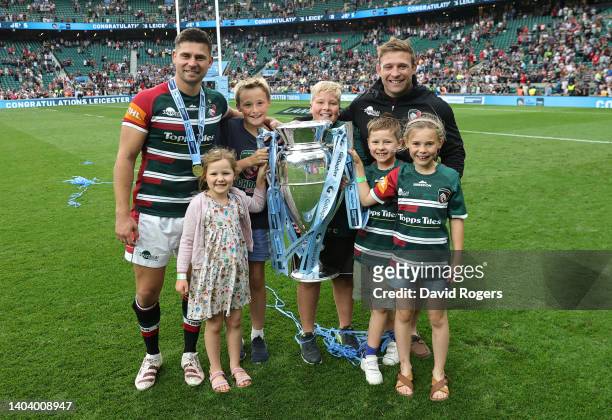 Tom Youngs and his brother Ben Youngs of Leicester Tigers celebrate with their children after their victory during the Gallagher Premiership Rugby...