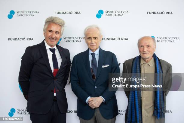 The head of FCB Femenino, Xavier Puig; the singer Josep Carreras and the painter Antonio Lopez, pose at the photocall before the presentation of the...