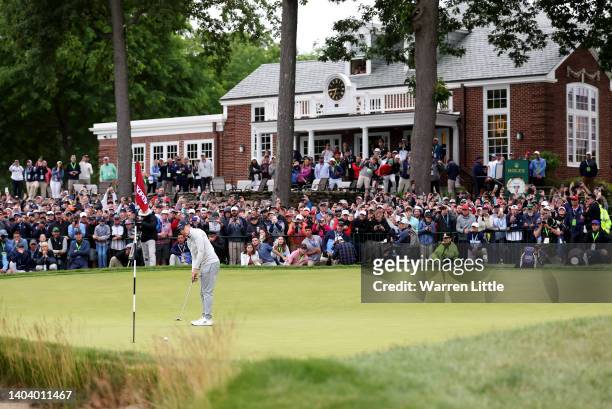 Matthew Fitzpatrick of England putts on the 18th green during the final round of the 122nd U.S. Open Championship at The Country Club on June 19,...
