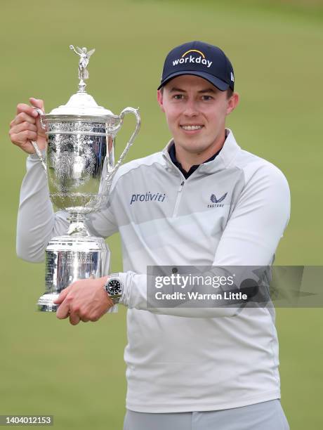 Matthew Fitzpatrick of England poses with the trophy after winning the 122nd U.S. Open Championship at The Country Club on June 19, 2022 in...