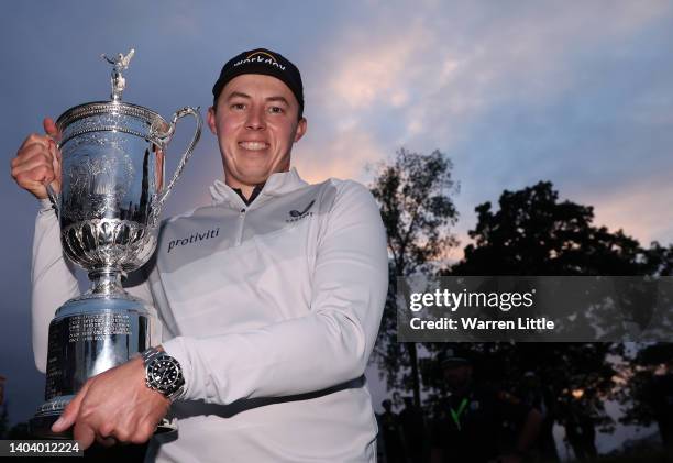 Matthew Fitzpatrick of England poses with the trophy after winning the 122nd U.S. Open Championship at The Country Club on June 19, 2022 in...