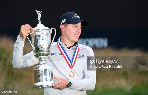 Matthew Fitzpatrick of England celebrates with the winners trophy after the final round of the 122nd U.S. Open Championship at The Country Club on...