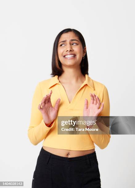 woman with disgusted facial expression - offense stock pictures, royalty-free photos & images