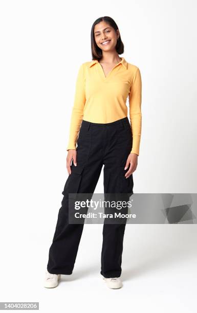 woman looking at camera - smart casual white background stock pictures, royalty-free photos & images