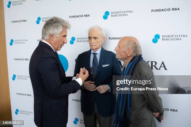 The three award winners, the head of FCB Femenino, Xavier Puig; the singer Josep Carreras and the painter Antonio Lopez, talk at the photocall before...