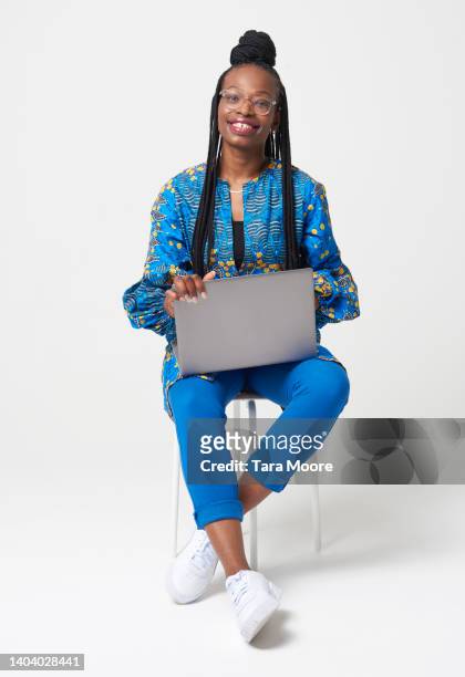 young woman with laptop - laptop studio shot stock pictures, royalty-free photos & images