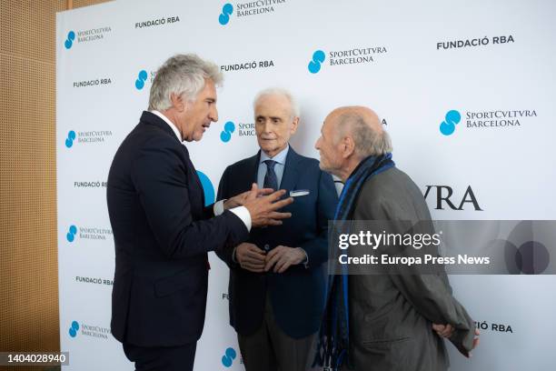 The three award winners, the head of FCB Femenino, Xavier Puig; the singer Josep Carreras and the painter Antonio Lopez, talk at the photocall before...