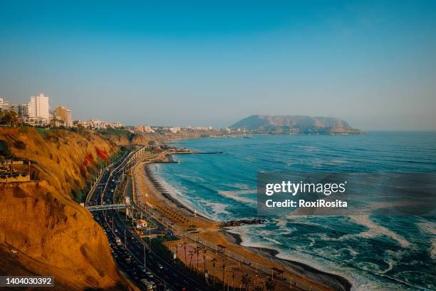 aerial view of the pacific ocean coast in lima peru - lima peru stock pictures, royalty-free photos & images