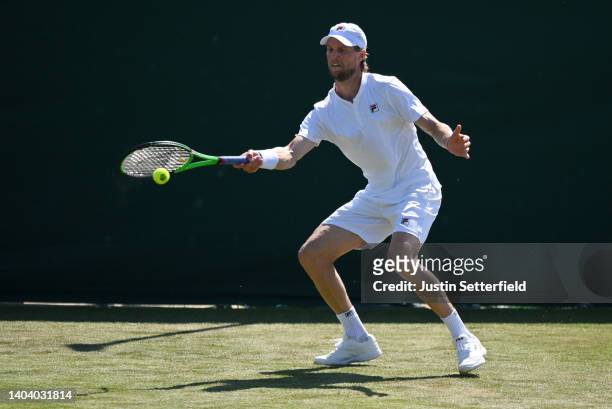 Andreas Seppi of Italy plays a forehand against Mirza Basic of Bosnia and Herzegovina in their Men's Singles First Round match during Day 1 of...