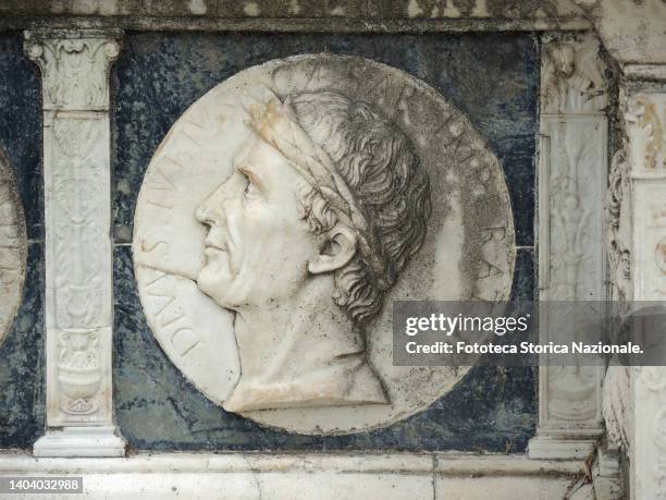 Portrait in bas-relief of Gaio Giulio Cesare military, dictator, Roman orator and writer. Bas-relief decoration from the band depicting famous people...