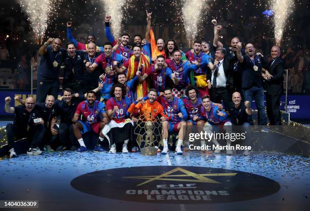 The team of Barca celebrate with the champions league trophy after beating Lomza Vive Kielce after extra time and penalty shoot out during the EHF...