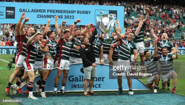 Ellis Genge and Tom Youngs of Leicester Tigers raise the Premiership trophy after their victory during the Gallagher Premiership Rugby Final match...