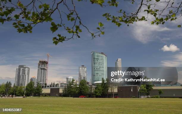 modern towers of surrey city centre in british columbia, canada - surrey stock pictures, royalty-free photos & images