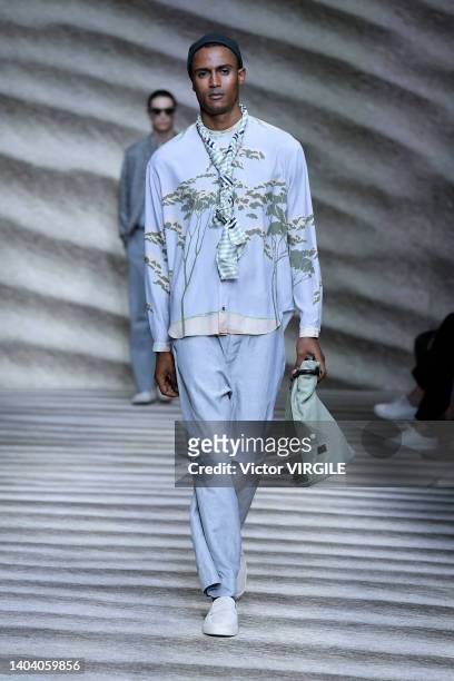 Model walks the runway during the Giorgio Armani Ready to Wear Spring/Summer 2023 fashion show as part of the Milan Men Fashion Week on June 20, 2022...
