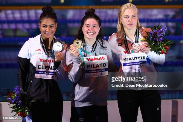 Silver medalist, Anna Elendt of Team Germany, Gold medalist, Benedetta Pilato of Team Italy and Bronze medalist, Ruta Meilutyte of Lithuania pose...