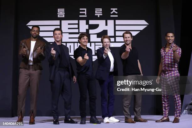 Jay Ellis, Miles Teller, Tom Cruise, Jerry Bruckheimer, Glen Powell and Greg Tarzan Davis attend during the 'Top Gun: Maverick' Press Conference at...