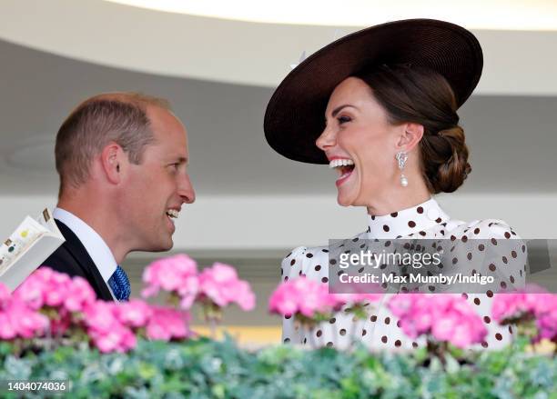 Prince William, Duke of Cambridge and Catherine, Duchess of Cambridge watch the racing from the Royal Box as they attend day 4 of Royal Ascot at...