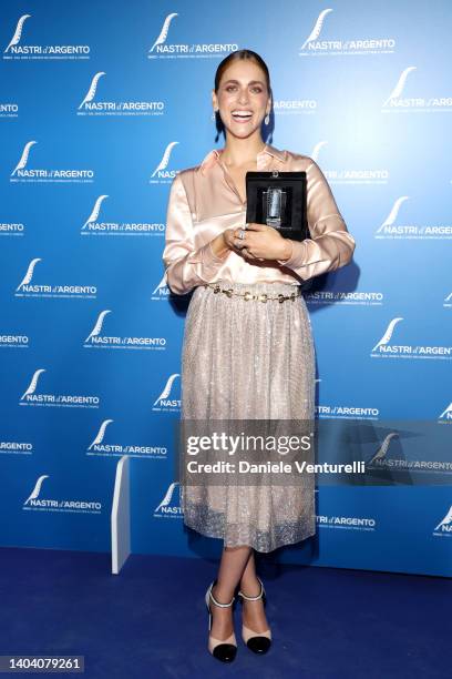 Miriam Leone poses with her Best Comedy Actress Award for "Corro da Te" at the 76th Nastri D'Argento 2022 on June 20, 2022 in Rome, Italy.
