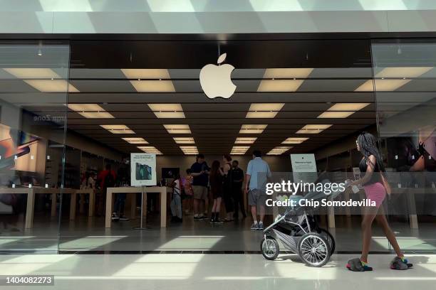 Customers shop at The Apple Store at the Towson Town Center mall, the first of the company's retail locations in the U.S. Where workers voted over...