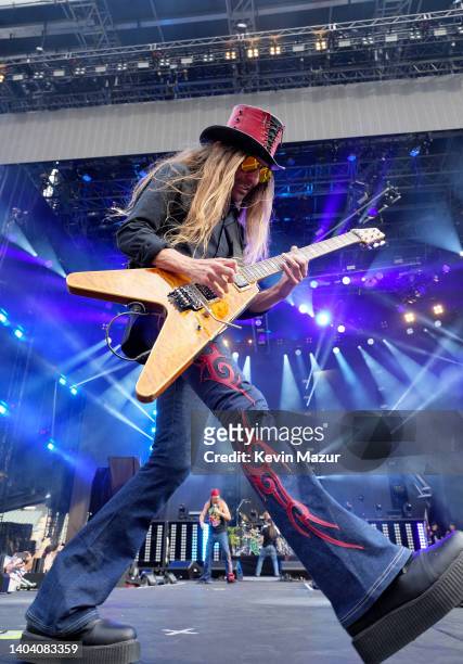 DeVille of Poison performs onstage during The Stadium Tour at Truist Park on June 16, 2022 in Atlanta, Georgia.