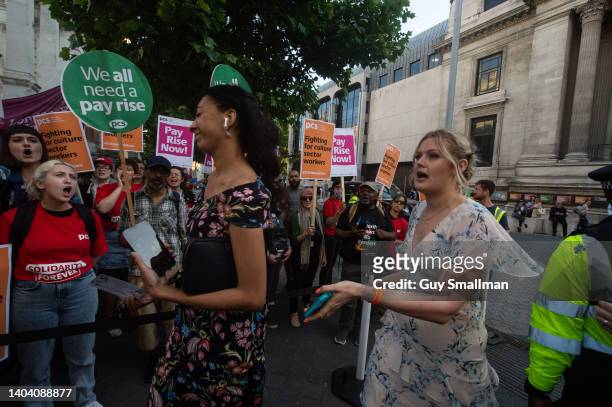 Conservative party donors run the gauntlet of booing protestors as members of the PCS Trade Union whom work in the culture sector protest at The V&A...