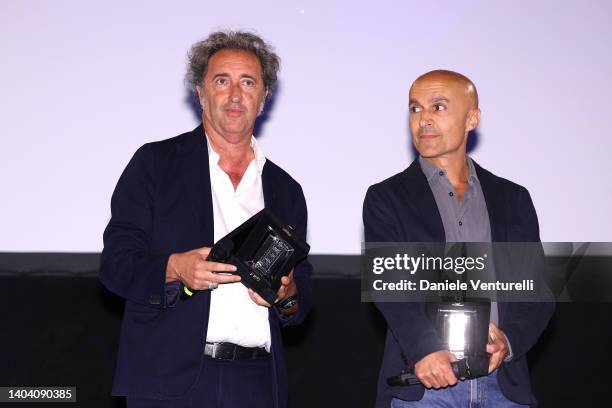 Paolo Sorrentino and Lorenzo Mieli receive on stage the Best 2022 Picture Award and the Best Producer Award for "The Hand of God" during the awards...