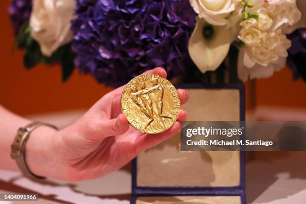 The 2021 Nobel Peace Prize awarded to Dmitry Muratov, editor-in-chief of the Russian newspaper Novaya Gazeta, is displayed during a charity auction...