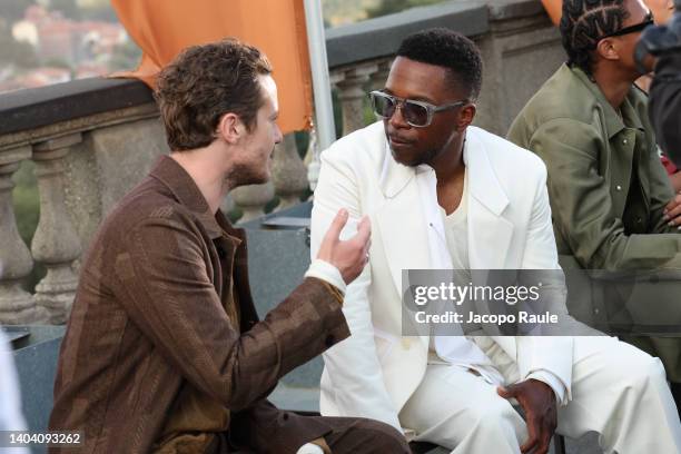 Joseph Quinn and Leslie Odom Jr are seen on the front row at the Zegna fashion show during the Milan Fashion Week S/S 2023 on June 20, 2022 in Milan,...