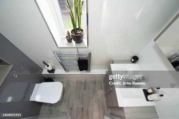 property bathroom interiors - looking under sink stock pictures, royalty-free photos & images