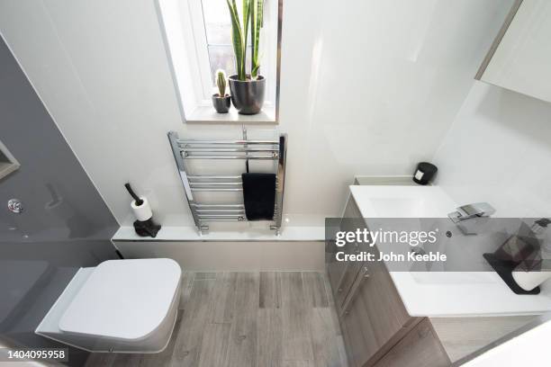 property bathroom interiors - looking under sink stock pictures, royalty-free photos & images